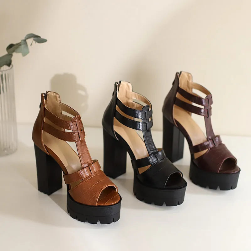 Women's black platform high heel sandals with a back zipper and round toe.