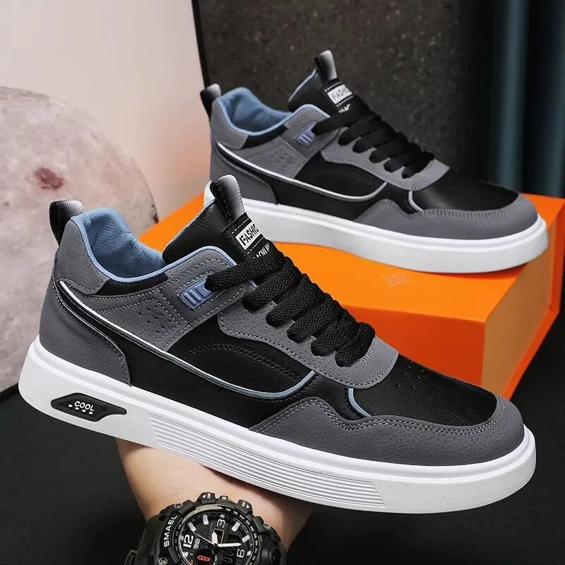 Men's low-top canvas board shoes in black with leather stitching and mesh lining.