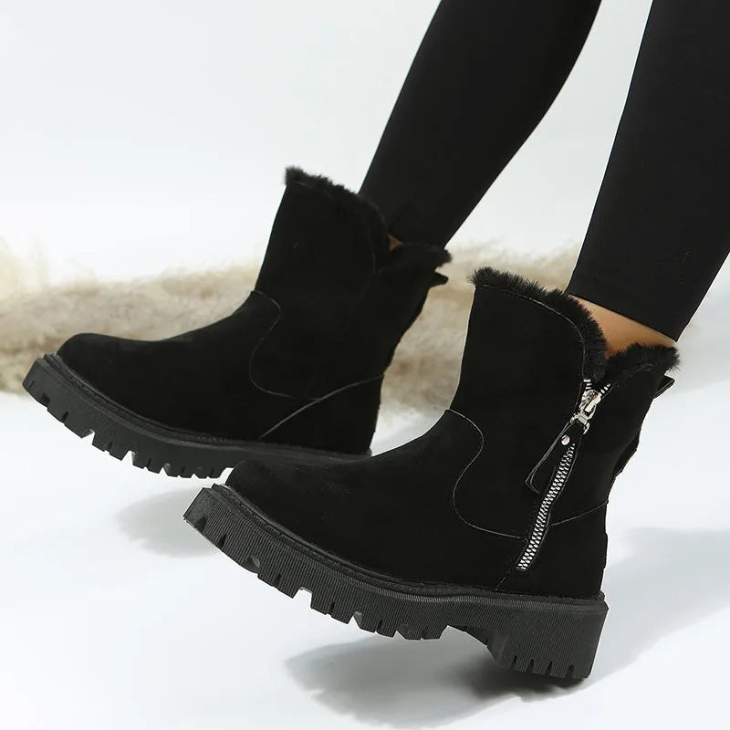 Women's black faux suede high-top snow boots with side zip and non-slip rubber sole.