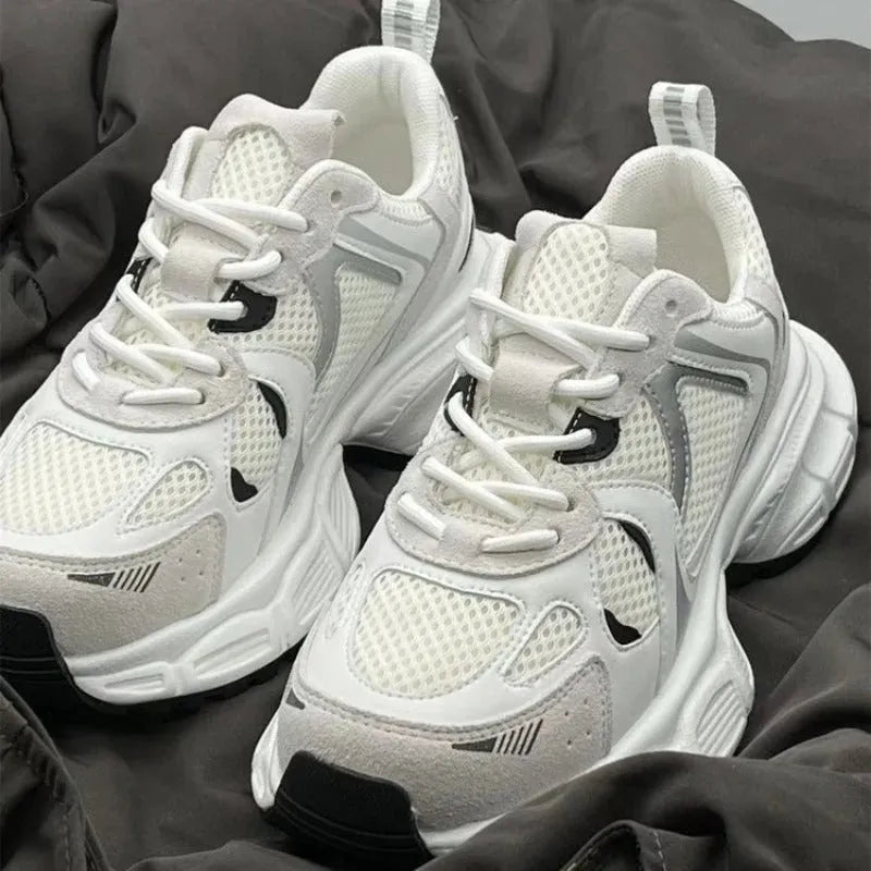 Beige Polar Wave mesh platform sneakers with a wedge heel and front lace-up on a rubber sole.