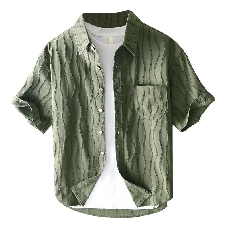 Man modelling a loose-fit apricot pure cotton short sleeve casual shirt