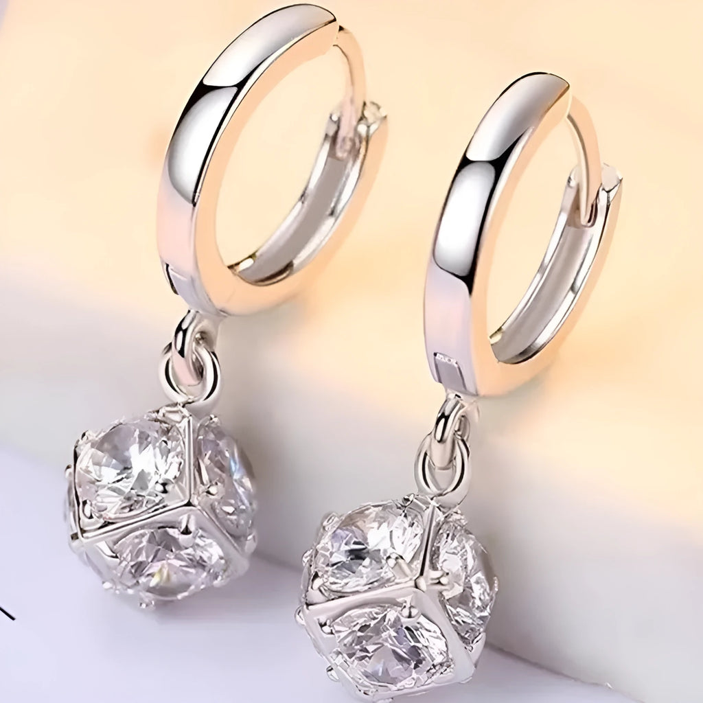 Close-up of a women's geometric rose design zircon earring with an electroplated finish.