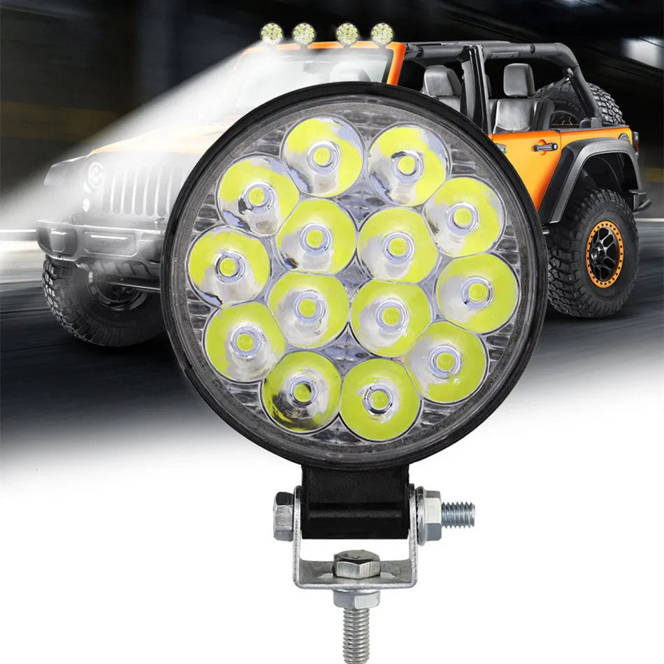 White LED work lights with round aluminum housing for car and vehicle auxiliary lighting