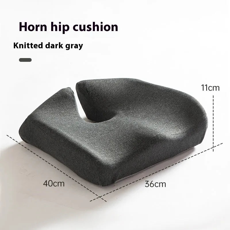 A dark grey memory foam office chair cushion measuring 36x40x11cm for lumbar support.