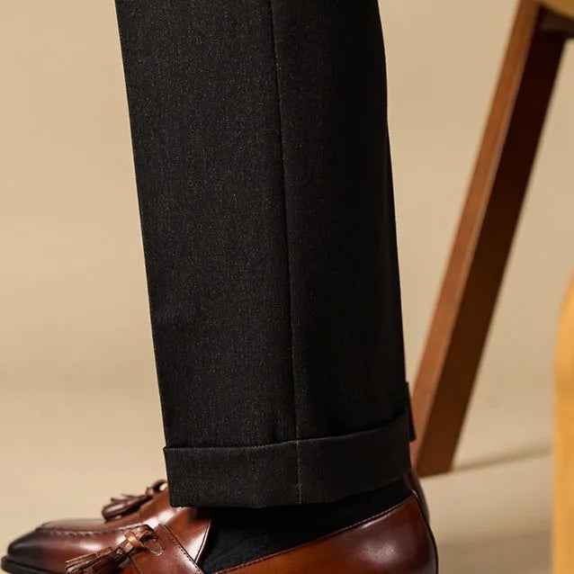 Men's genuine leather tassel loafers in black and brown colours showing polished upper and rubber sole