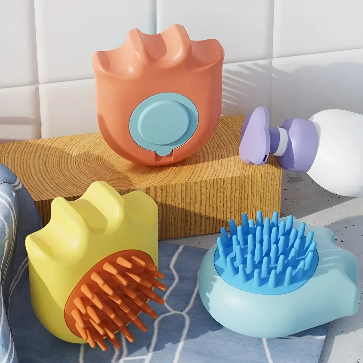 Pet bath brush with integrated shampoo box and four interchangeable brush heads in blue colour