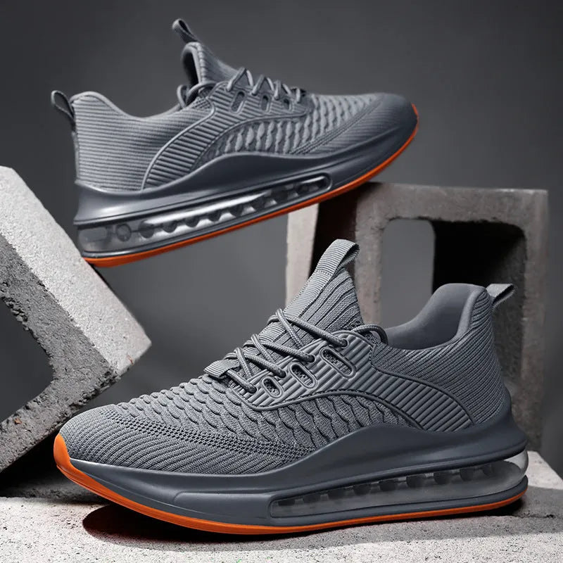 Men's solid-colour low-top mesh running shoes with lace-up front and rubber sole.