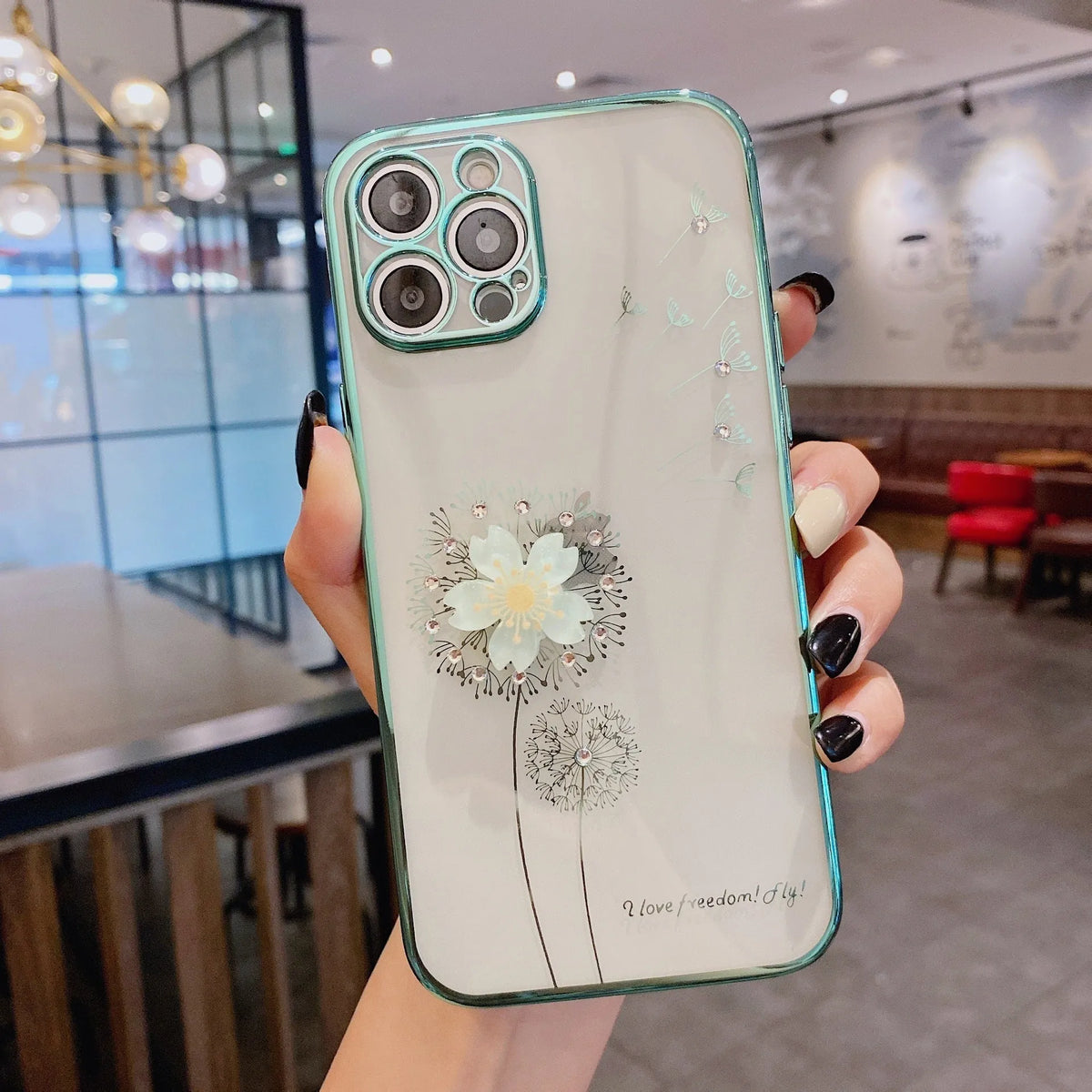 Green TPU iPhone case with a floral design and built-in screen protector shown on an iPhone.