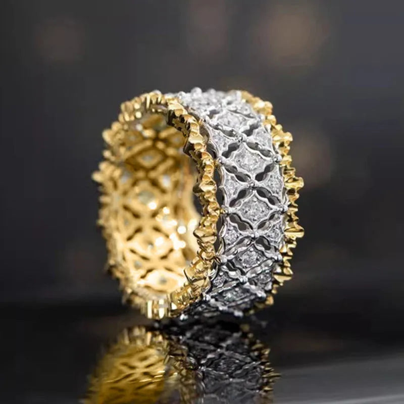 Gold two-tone geometric zircon ring with round elements on copper with electroplated finish