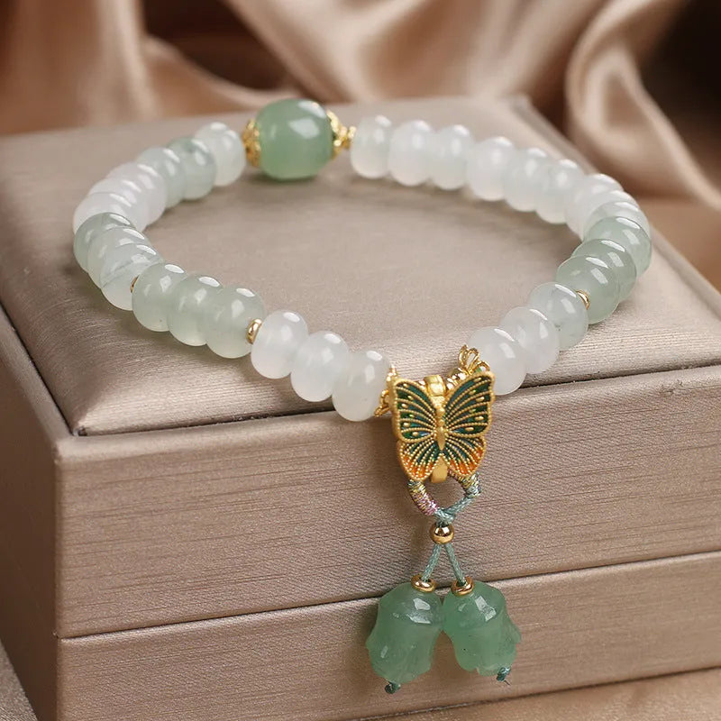 Green Tian Shan Cui abacus bead bracelet with retro butterfly tassel and pearl decoration