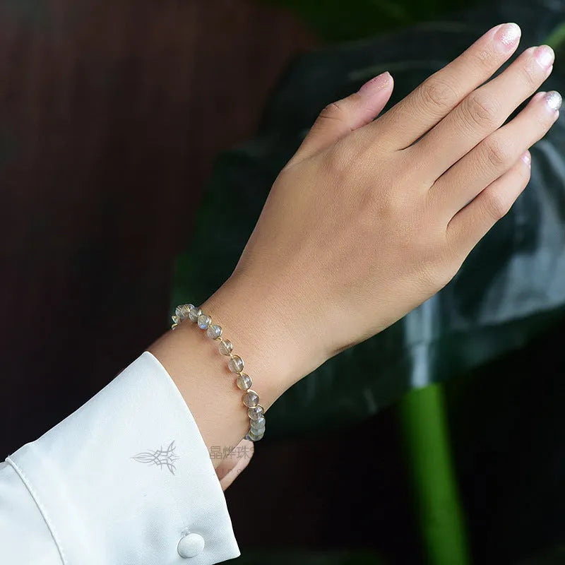 Women's blue moonstone crystal bracelet with 6mm stones on 14K gold-plated chain