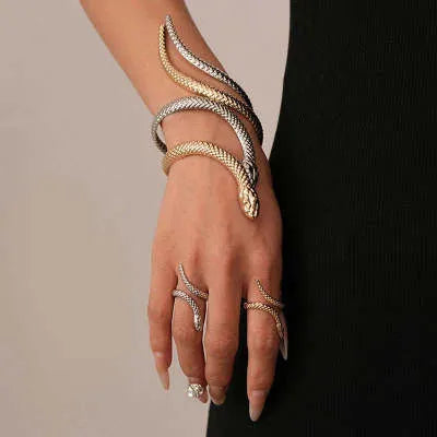 Exaggerated twisted winding simulated snake metal ring and bracelet jewellery set in gold and silver electroplated finishes