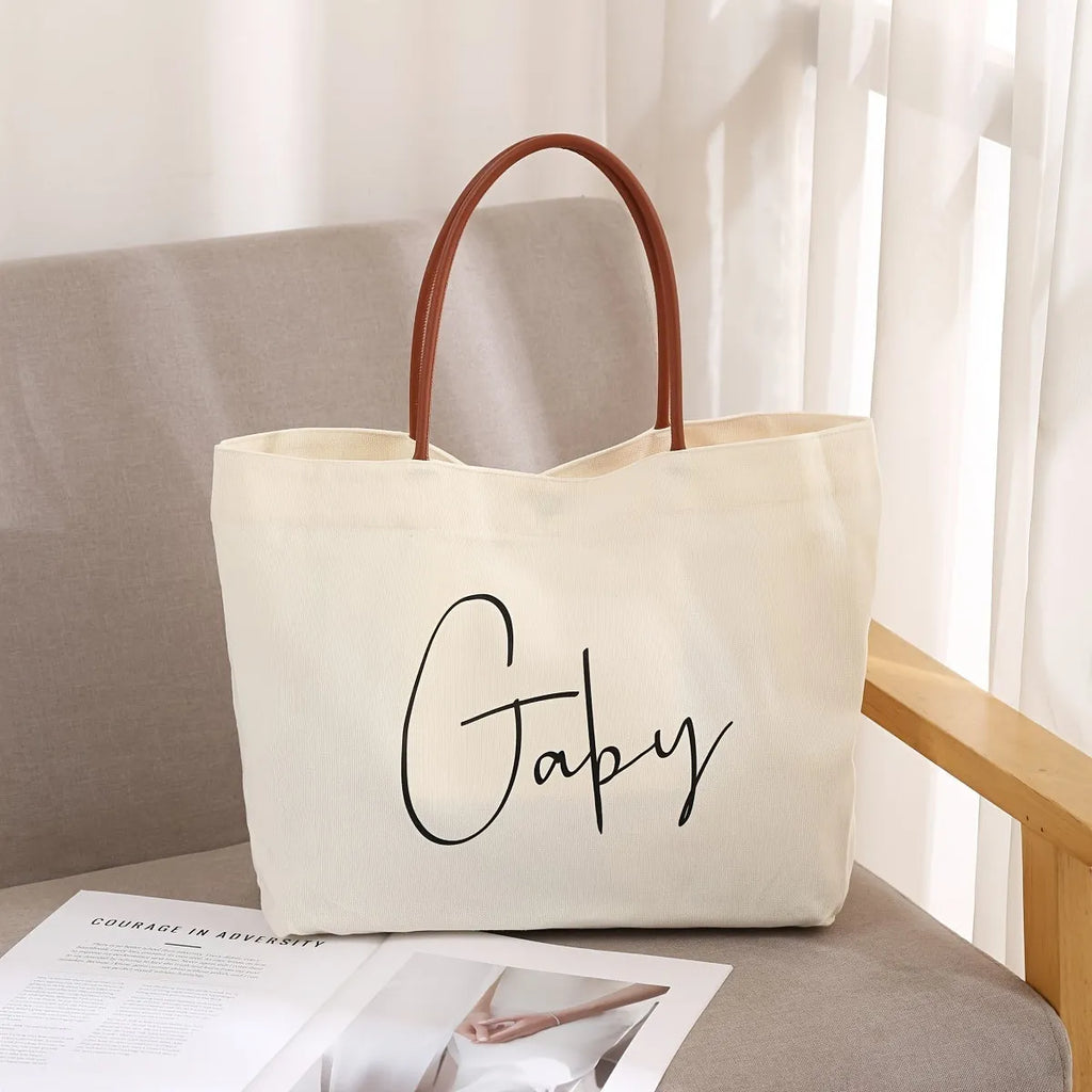 Beige white canvas tote bag made of cotton and jute with reinforced fabric handles