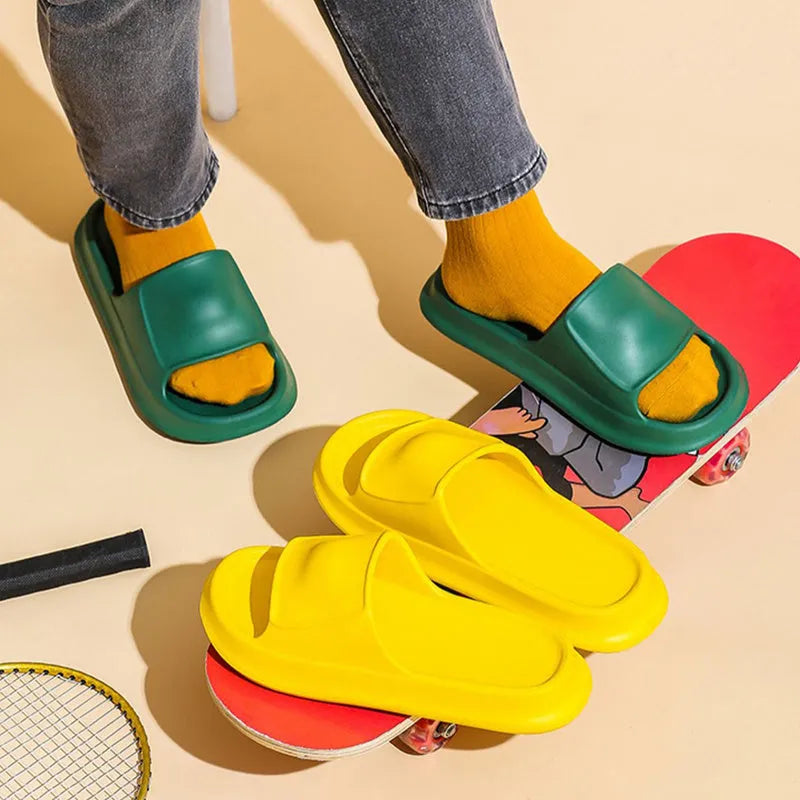 Unisex thick-soled EVA flip-flop slippers in various colours on a white background.