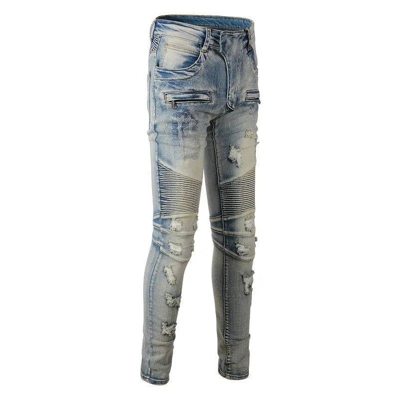 Light blue men's slim fit distressed jeans with hand-frayed details on a mid waist, showing a light straight leg cut.