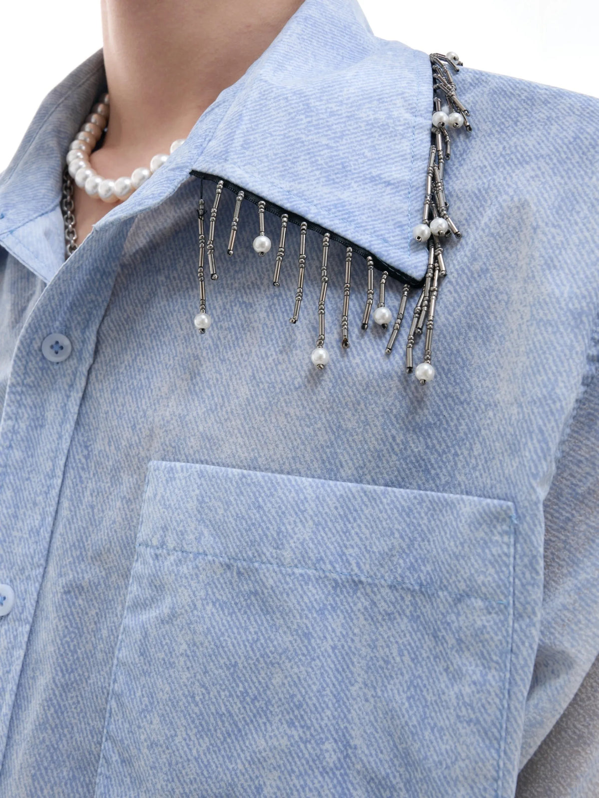 A loose-fitting men's blue to white gradient short-sleeve shirt for casual summer wear.