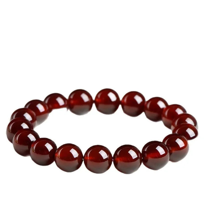 Natural orange red garnet crystal bead bracelet with retro design on wrist
