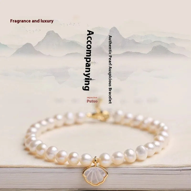 Real natural 5-6mm freshwater pearl bracelet with fan shape design and alloy details on 16cm band
