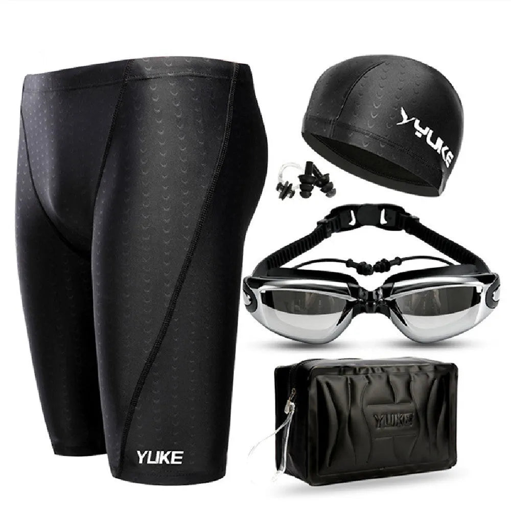 Men's black swimming set with polyester trunks, anti-fog goggles, waterproof cap, accessories and carrying bag