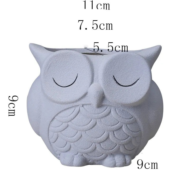 Handmade frosted ceramic owl succulent pot in light pink, white, green, or blue.