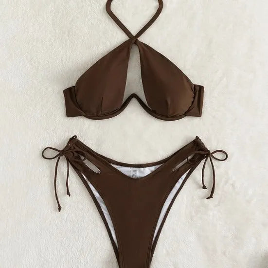 Brown women's halter bikini swimsuit with briefs bottom on a neutral background.
