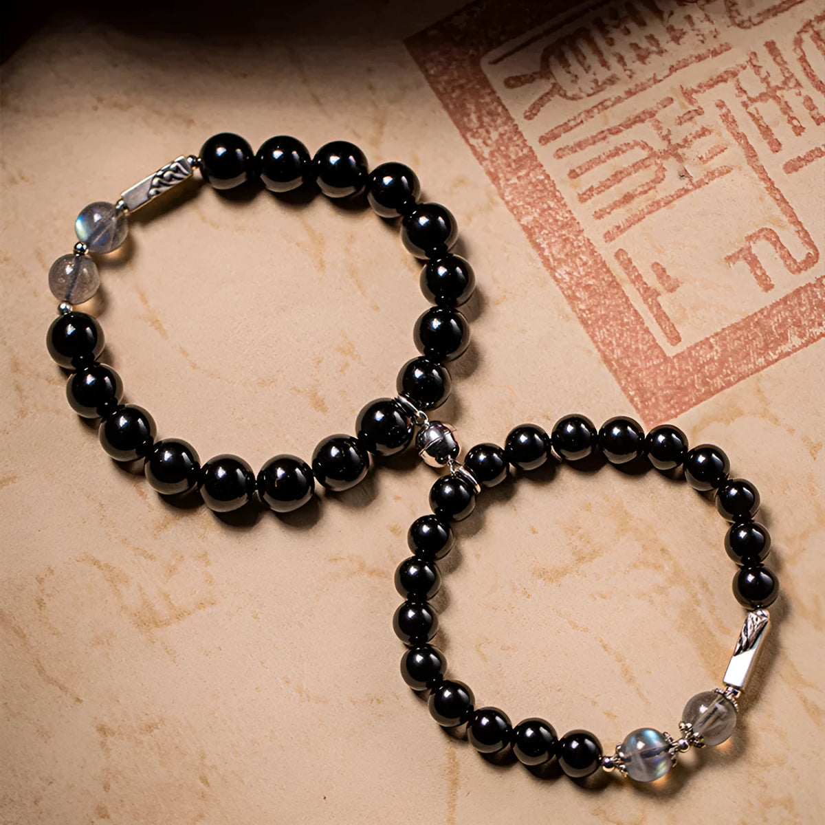 Obsidian Buddha beads couple bracelet DIY set showing 8mm and 10mm black stone beads
