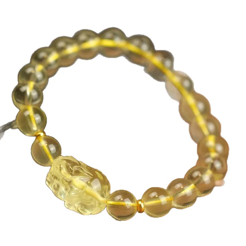 Yellow leather citrine pi xiu bracelet with artificial crystal beads and adjustable leather cord fastening