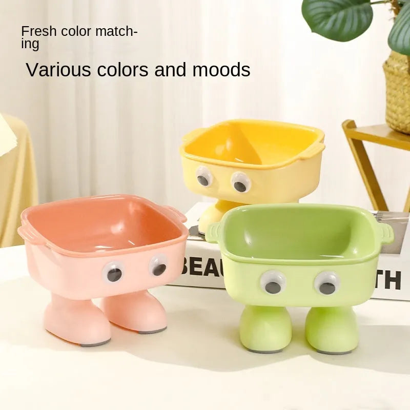 Green elevated cat bowl with 15° tilt, robot design, and anti-slip base