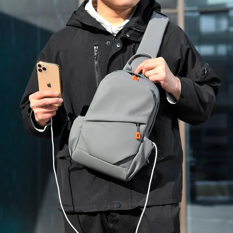 Men's waterproof polyester casual crossbody bag in black with single shoulder strap