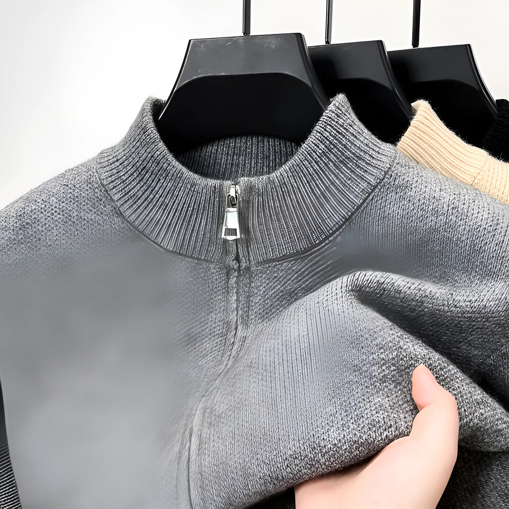 Men's black knitted zip cardigan with stand collar showing loose fit and thickened fabric texture