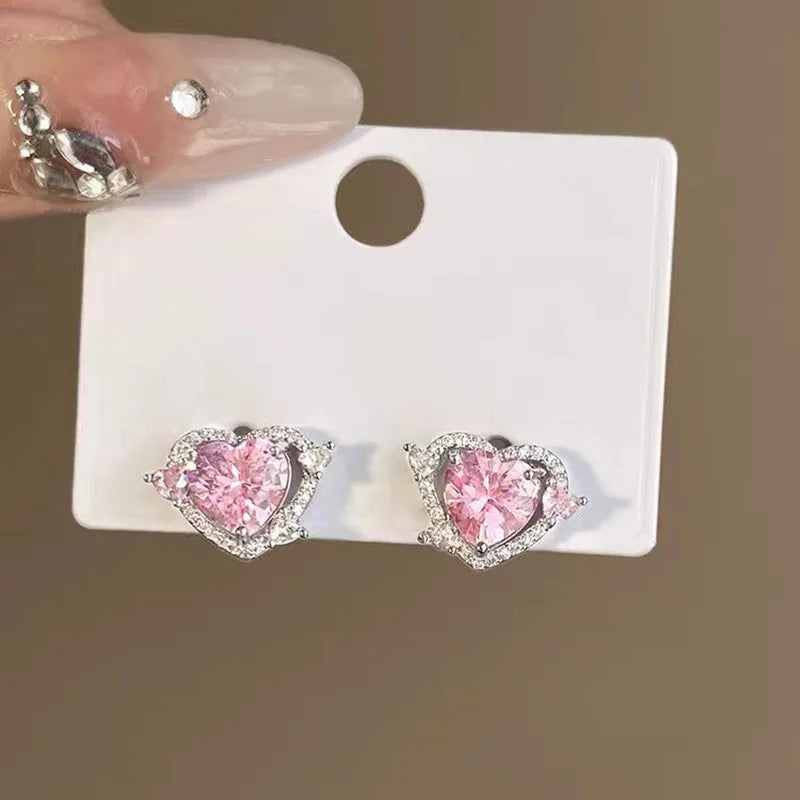 Women's heart-shaped stud earrings with white K electroplated finish on copper