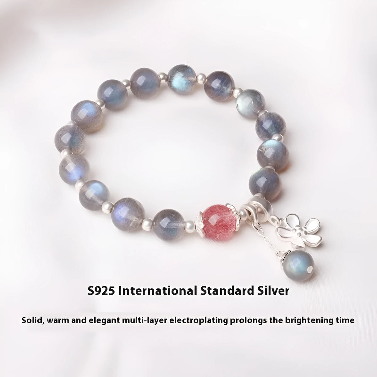 925 sterling silver honeysuckle bracelet with moonlight lime and strawberry crystals on wrist