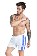 Men's blue lace-up sports shorts with padding on a shorts-length, slim-fit design
