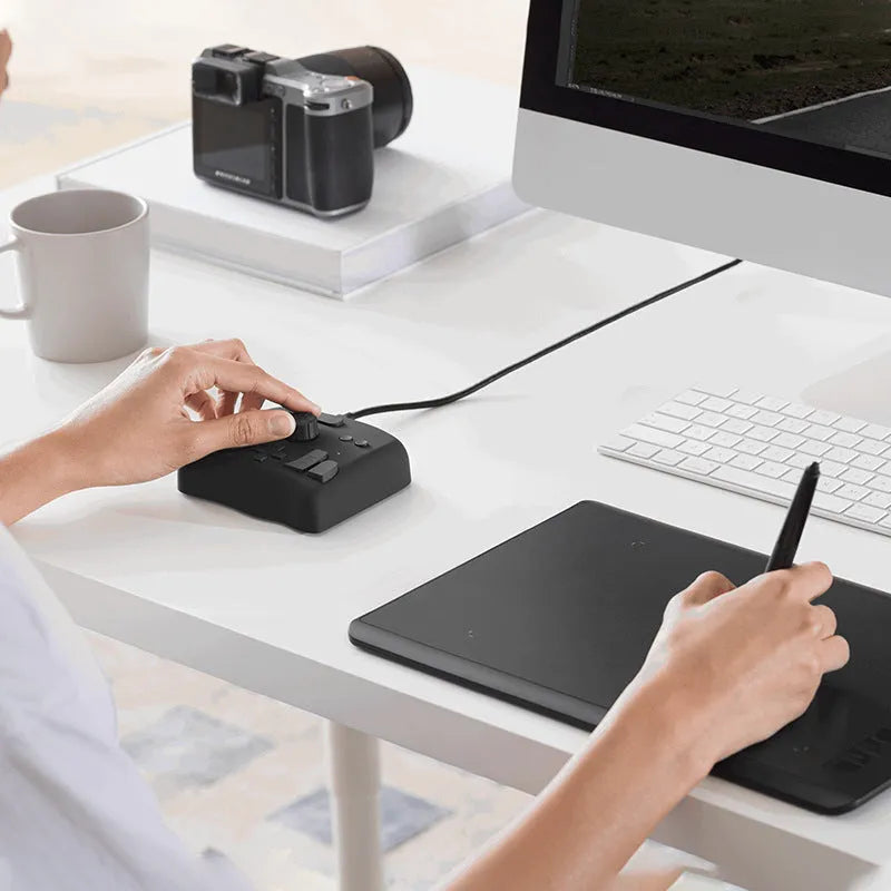 TourBox NEO USB digital editing controller and auxiliary keyboard with portable bag.