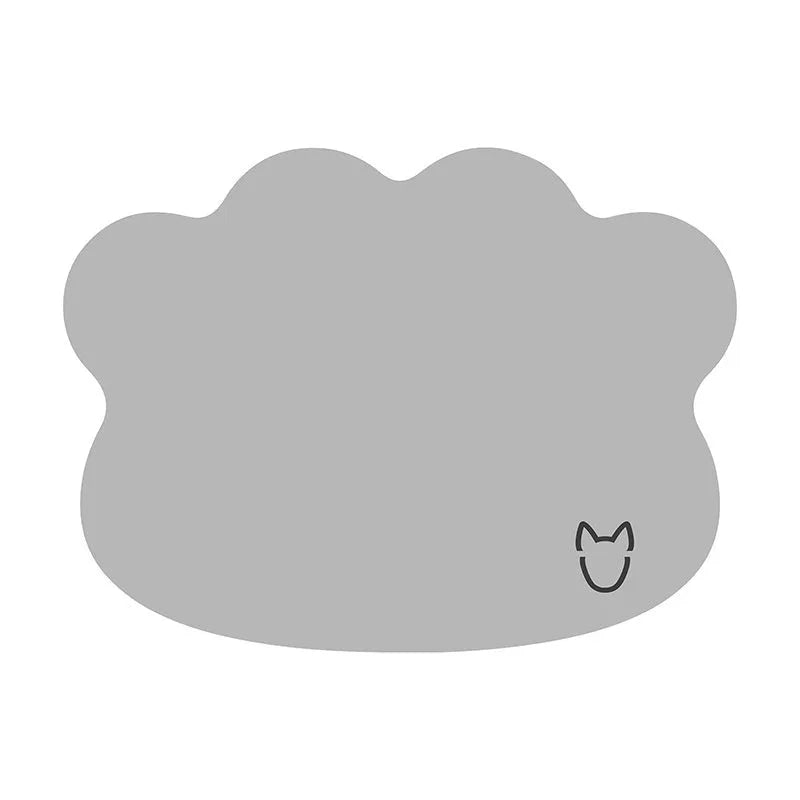 Ice silk pet cooling mat in dog head shape, shown in light gray, on a wooden floor