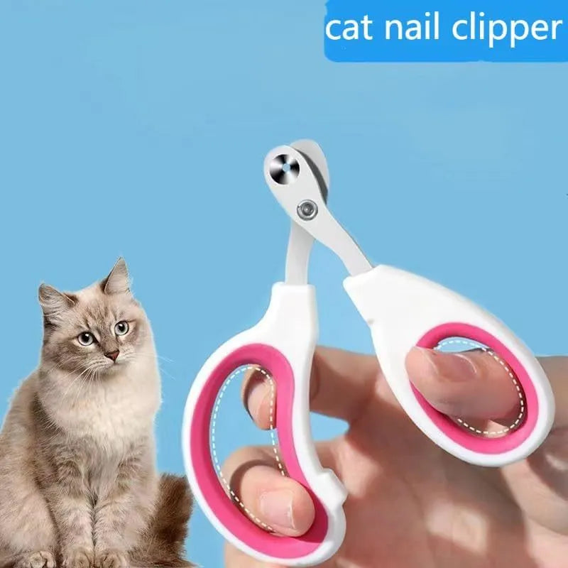 Blue cat nail clippers with circular cutting hole and cushioned handle on a white surface.