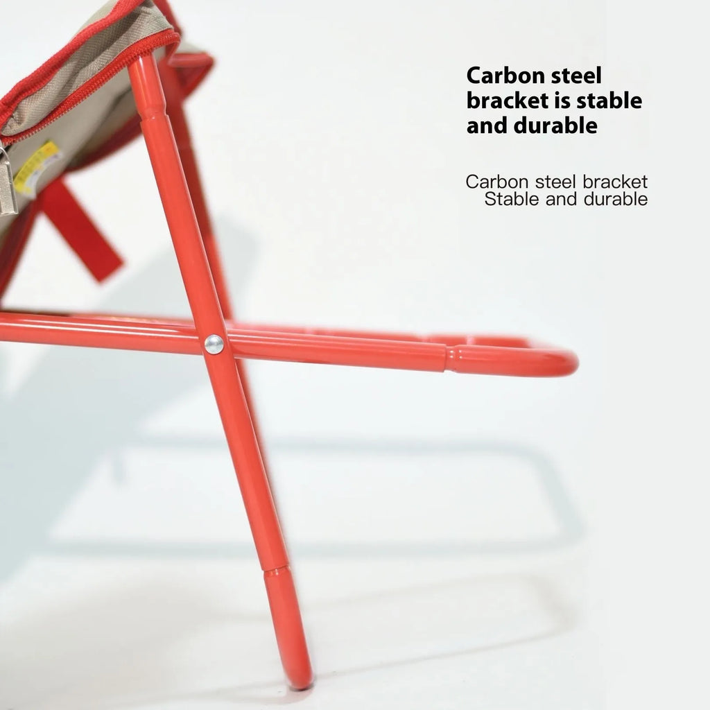 Foldable outdoor camp stool in Oxford cloth, shown in khaki colour, collapsed into its compact pencil box design.