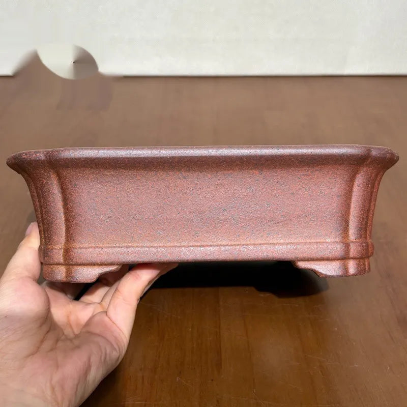 Rectangular stoneware flower pot in reddish brown with hand-glazed finish and 17cm base, for bonsai or firewood display.