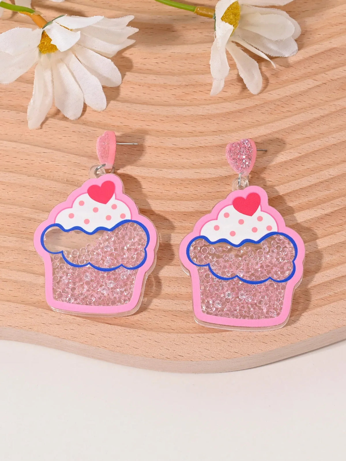 A pair of acrylic earrings shaped like a cherry, strawberry, watermelon, pineapple, coconut cake, or ice cream.