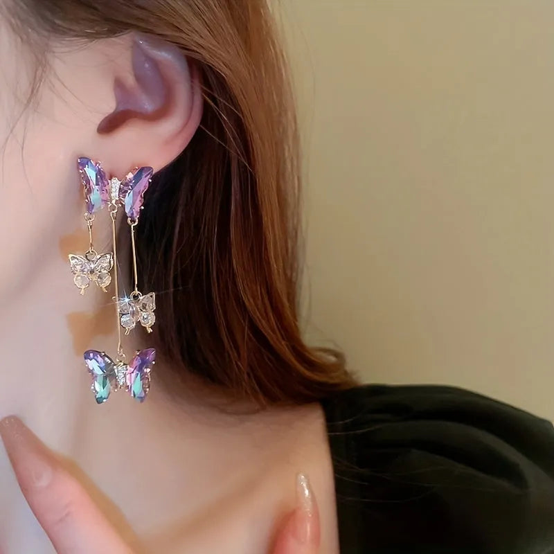 Blue purple butterfly tassel earrings with crystal flower decoration on silver electroplated alloy