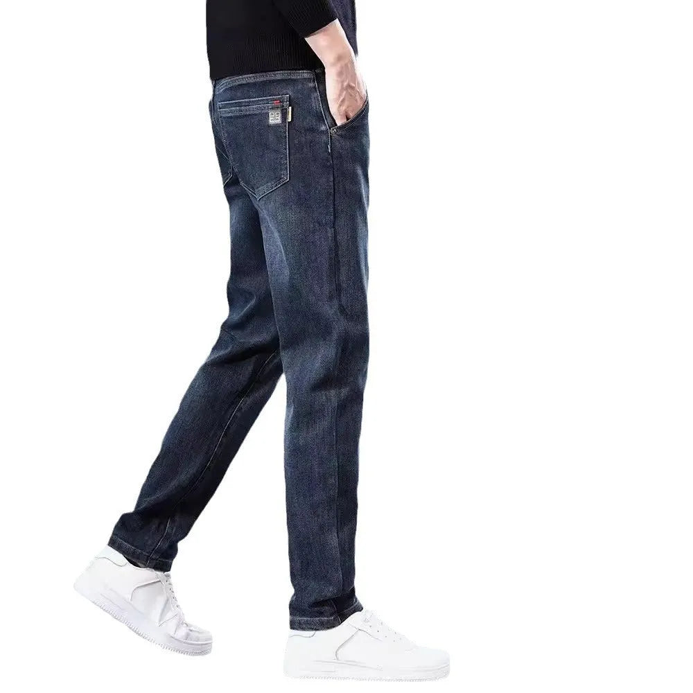 Men's slim straight casual trousers in blue grey, showing loose fit and street fashion style.