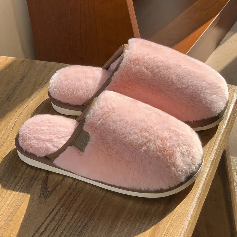 PVC winter plush slippers in solid colours with non-slip soles and car stitching detail