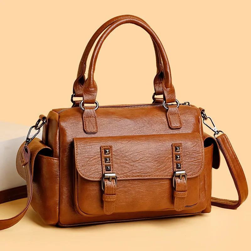 Vintage messenger bag in horizontal square shape with contrast stitching, shown in available colour options