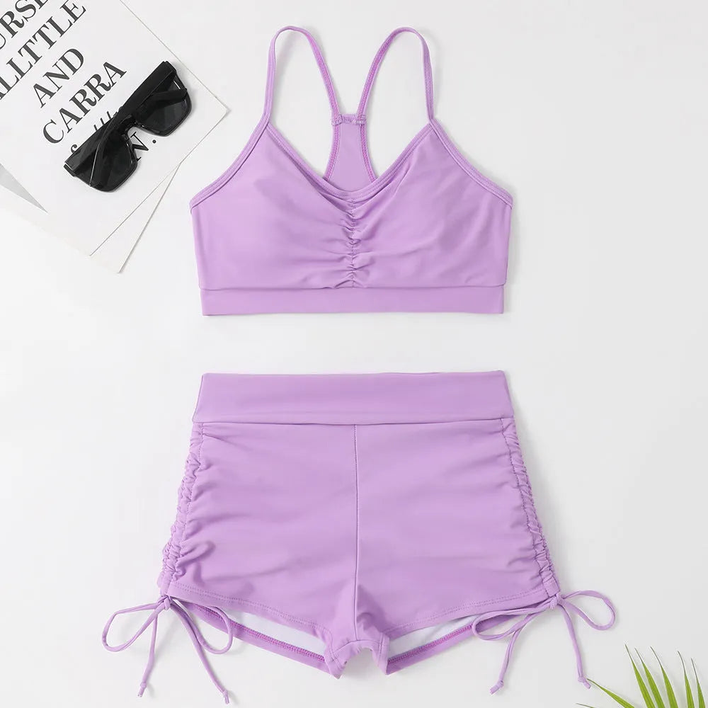Women's purple high-waist split swimsuit with sleeveless design for swimming and surfing