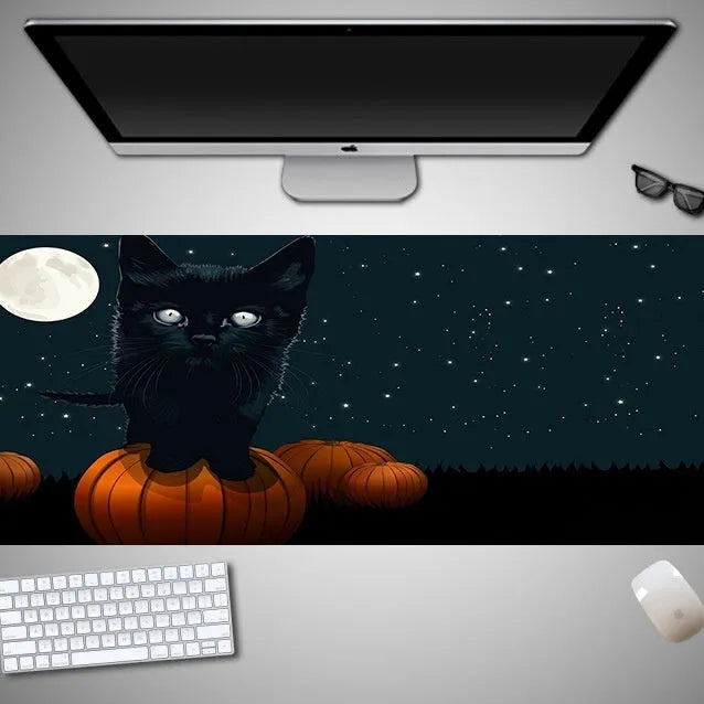Oversized Halloween gaming mouse pad showing one of 28 available character designs on rubber cloth surface