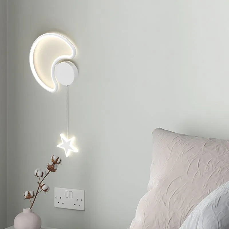 Cloud and star shaped children's bedside wall lamp with LED lighting in black or white finish