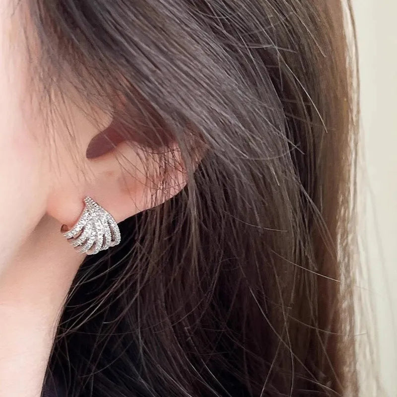 Women's geometric zircon earrings with platinum electroplated finish and line design