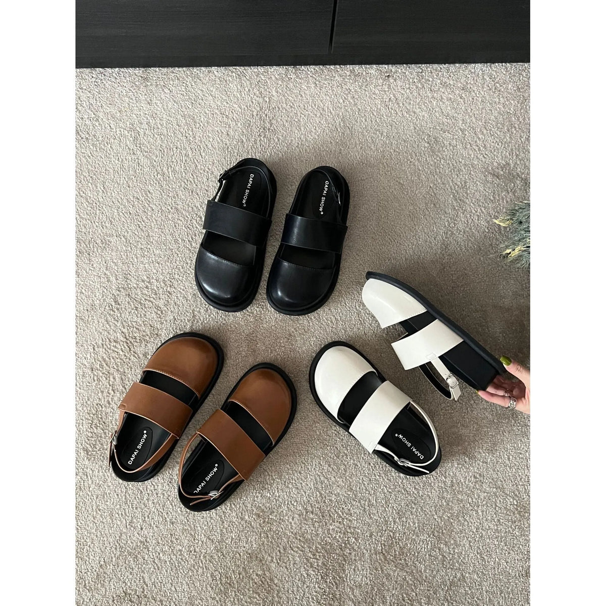 Retro brown women's ankle-strap buckle sandals with a closed toe and microfiber upper.