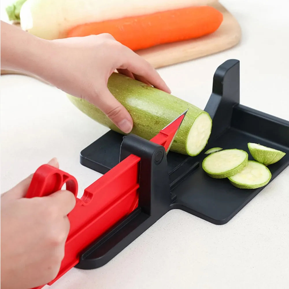 Green vegetable cutter with stainless steel blades for cutting carrots and potatoes