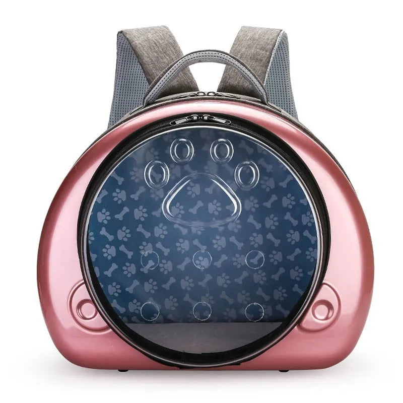 Transparent hard-shell pet carrier bag with metallic rose gold front cover.